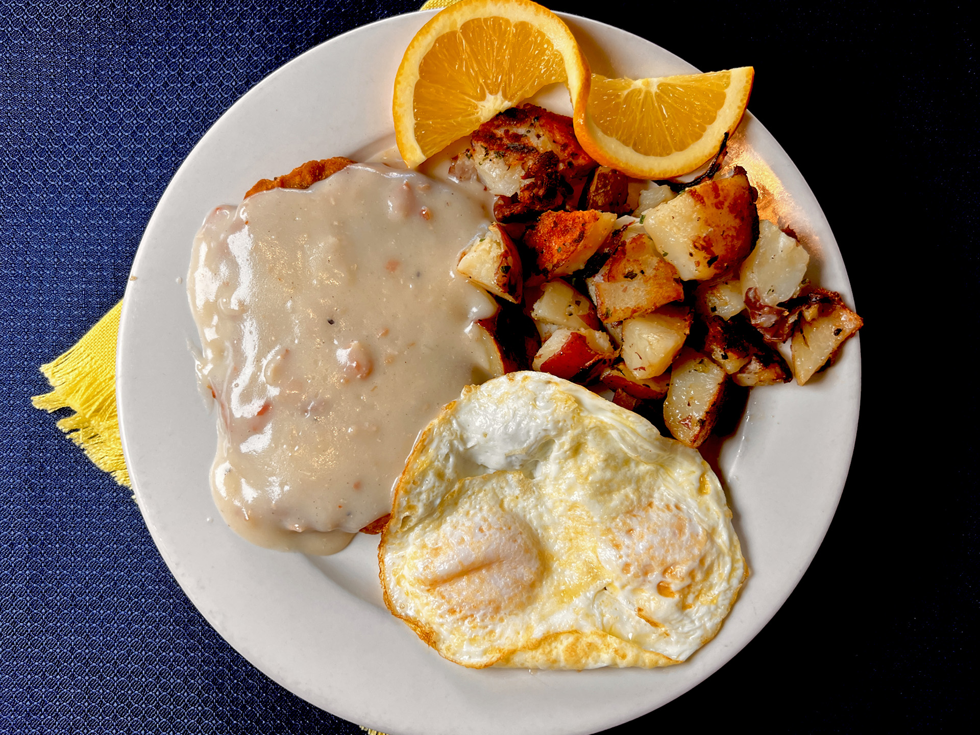 Roasted Potatoes Eggs FriedPattyWithSauce