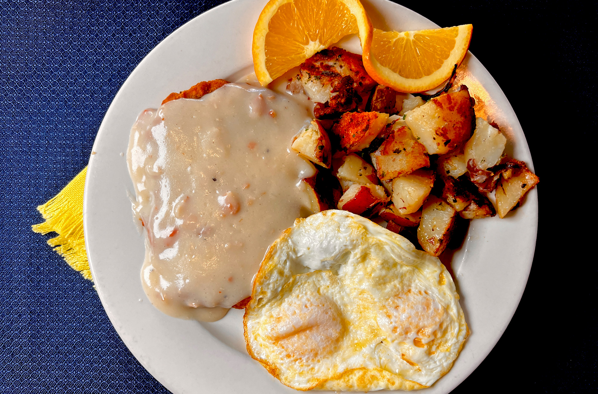 Roasted-Potatoes-Eggs-FriedPattyWithSauce